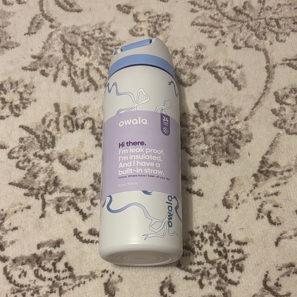 Blue Bow Owala Insulated Water Bottle with Built-in Straw